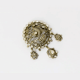 A diamond polki and round brilliant diamond pendant in an open setting that enhances brilliance. Finished with antique gold polish and paired with a delicate gold chain, it reflects timeless craftsmanship and understated elegance. (KMPE1320)