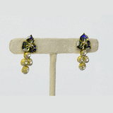 A pendant and earring set featuring diamond polki and round brilliant diamonds, accented with green and blue French enamel. Designed in a refined fusion style, it blends traditional artistry with a contemporary touch, ideal for festive occasions(KMPE1348)