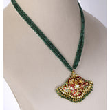 Royal Pankhi Pendant Set Traditional Pankhi pendant set adorned with vibrant red meenakari, sparkling diamond polki, and emerald bead stringing, paired with matching earrings for timeless regal elegance.(KMPE1360)