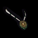 Graceful peacock pendant set adorned with diamond polki, delicately strung with pearls and emerald maniya, celebrating timeless heritage and refined elegance.(KMPE1364)