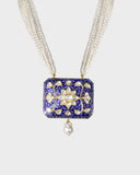 A stunning blue meena pendant adorned with sparkling diamond polki, beautifully strung with lustrous pearls. This traditional design blends vibrant enamel artistry with timeless elegance, perfect for festive occasions.(KMPE1365)