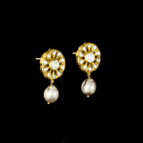 Radiate timeless elegance with these exquisite Diamond Polki tops, beautifully accented with lustrous pearl drops—perfect for adding royal charm to every occasion.(KMPE1368)