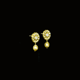 Radiate timeless elegance with these exquisite Diamond Polki tops, beautifully accented with lustrous pearl drops—perfect for adding royal charm to every occasion.(KMPE1368)