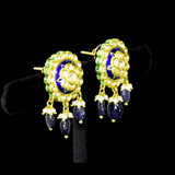 Blue Meenakari Pendant Set Elegant blue meenakari pendant set adorned with diamond polki, gracefully strung with pearls and sapphire maniya, celebrating timeless heritage and sophistication.(KMPE1372)