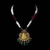 Divine Temple Pendant Exquisite temple-style pendant featuring Goddess Lakshmi, sparkling diamond polki, vibrant coloured gemstones, and emerald drops, celebrating timeless heritage and divine elegance.(KMPE1373)