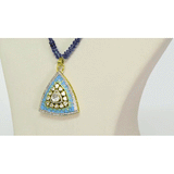 A stunning fusion-style pendant and earring set featuring Firoza Meena, Diamond Polki, and brilliant diamonds, elegantly paired with sapphire bead strands for a vibrant, luxurious, and timeless statement look.(KMPE1381)