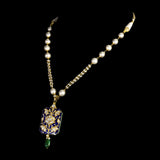 Blue Meenakari Pendant Set Elegant blue meenakari pendant set adorned with diamond polki, gracefully strung with pearls and emerald accents, blending timeless artistry with refined elegance.(KMPE1397)