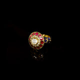 Celebrate timeless beauty with this traditional Jadau ring, adorned with vibrant color stones and sparkling diamond Polki. A masterpiece of heritage craftsmanship, perfect for adding regal elegance to any occasion.(KMR0168)