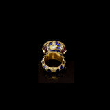 Celebrate timeless beauty with this traditional Jadau ring, adorned with vibrant color stones and sparkling diamond Polki. A masterpiece of heritage craftsmanship, perfect for adding regal elegance to any occasion.(KMR0168)