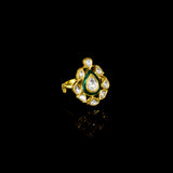 Grace your fingers with this green enameled ring, featuring uncut diamond Polki. Adjustable in size, it blends traditional charm with modern comfort for effortless elegance.(KMR0173)
