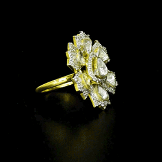 Radiant Diamond Polki Ring Exquisite diamond polki and brilliant diamonds bloom in a floral-inspired ring, radiating timeless elegance.(KMR0179)