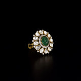 Emerald Halo Ring A vivid emerald takes center stage, encircled by radiant diamond polki and brilliant diamonds, creating a timeless statement of refined luxury.(KMR0180)