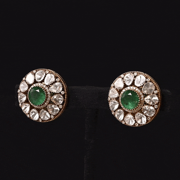 Elegant floral tops showcasing the brilliance of Diamond Polki and the rich allure of emerald for timeless beauty.(NP361)