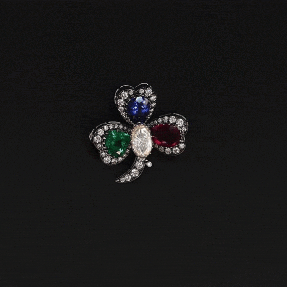 An heirloom-worthy floral brooch crafted with luminous Diamond Polki, vivid emerald, ruby, sapphire, and brilliant diamonds.(NP391)