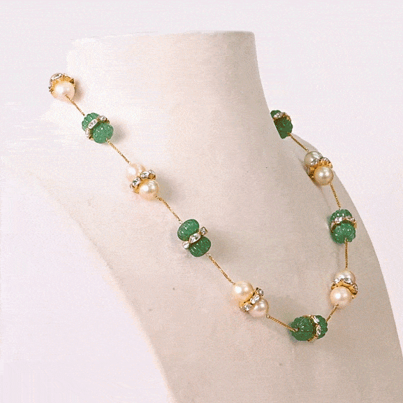 Gracefully strung with luminous pearls, carved emerald beads, and handcrafted Diamond Polki accents, this necklace is understated luxury at its finest.(NP392)