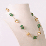 Gracefully strung with luminous pearls, carved emerald beads, and handcrafted Diamond Polki accents, this necklace is understated luxury at its finest.(NP392)