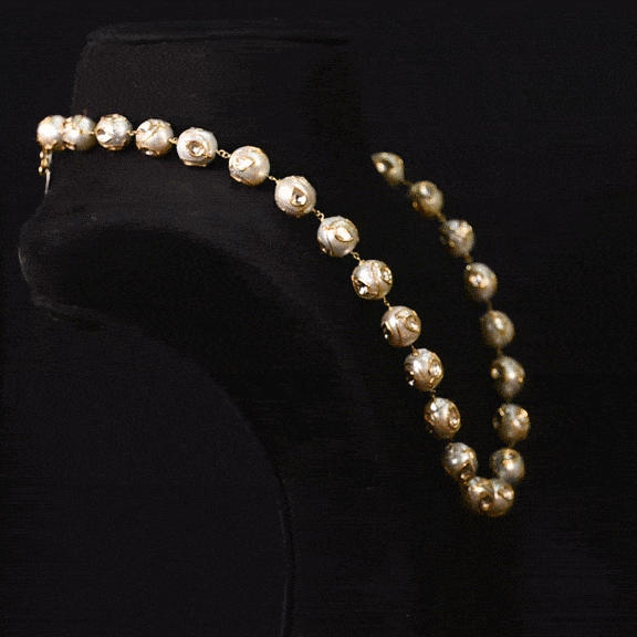 Unmatched in design, this artistic necklace pairs luxurious South Sea pearls with handcrafted Diamond Polki for timeless sophistication.(NP393)