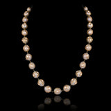 Unmatched in design, this artistic necklace pairs luxurious South Sea pearls with handcrafted Diamond Polki for timeless sophistication.(NP393)