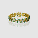 Emerald Diamond Bangle Elegant bangle adorned with vibrant pear-shaped emeralds and brilliant diamonds, beautifully arranged in a graceful floral pattern for timeless sophistication and luxury.(PGDB078)