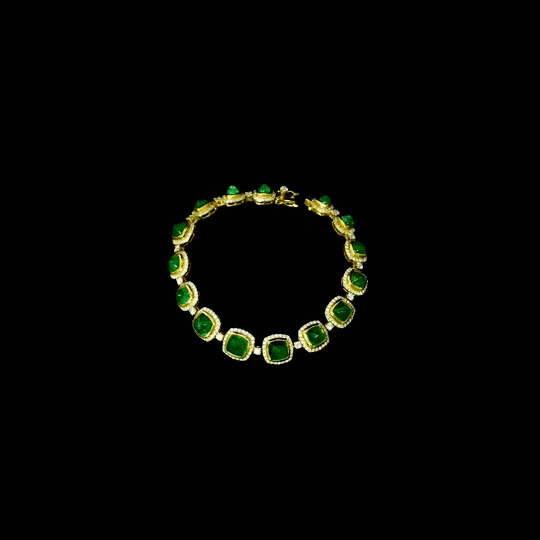 Beautiful emerald cabochons and sparkling diamonds come together in this elegant bracelet, making it a perfect piece to add charm, style, and everyday luxury to your jewelry collection.(PGDBR044)