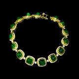 Beautiful emerald cabochons and sparkling diamonds come together in this elegant bracelet, making it a perfect piece to add charm, style, and everyday luxury to your jewelry collection.(PGDBR044)