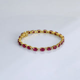 Sleek ruby and diamond bracelet featuring vibrant color, subtle sparkle, and timeless elegance—perfect for everyday wear and celebrations.(PGDBR076)