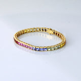 Bursting with vibrant sapphire hues, this bracelet brings together color, sparkle, and elegance for a truly eye-catching statement.(PGDBR079)