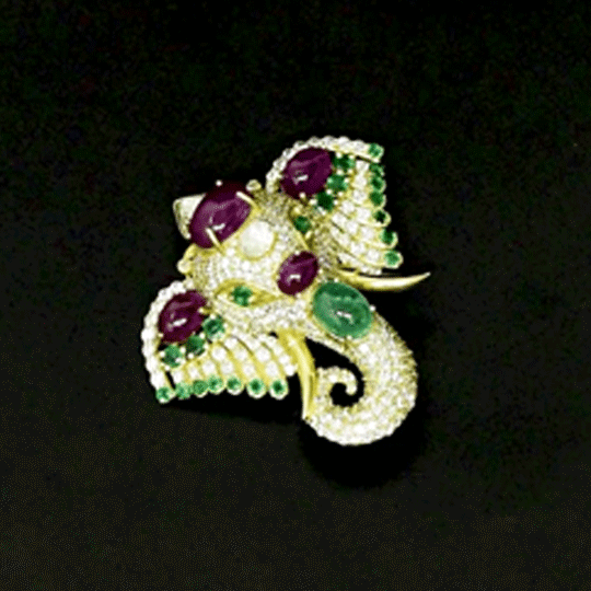 Royal Elephant Brooch Majestic elephant brooch adorned with vibrant rubies, rich emeralds, and brilliant diamonds, blending artistic craftsmanship with timeless elegance and regal charm.(PGDBRCH003)