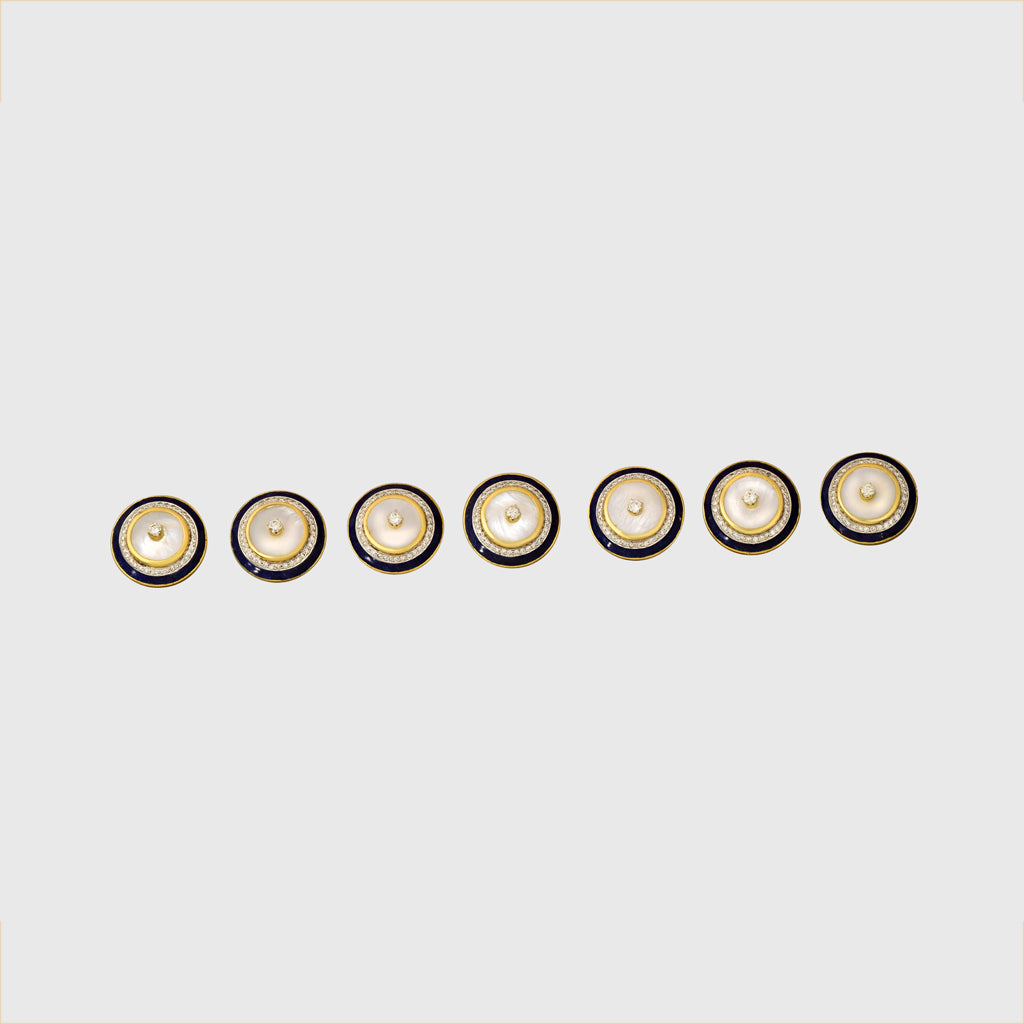 Add a touch of royal elegance with these blue enameled sherwani buttons, featuring round diamonds and a mother-of-pearl centerpiece—perfectly crafted to elevate your traditional attire with timeless sophistication.(PGDBT0009)