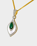 A beautifully crafted pendant and earring set featuring pear-shaped emeralds, diamonds, and mother-of-pearl, blending vibrant colour with delicate design for luxurious elegance. (PGDPE0119)
