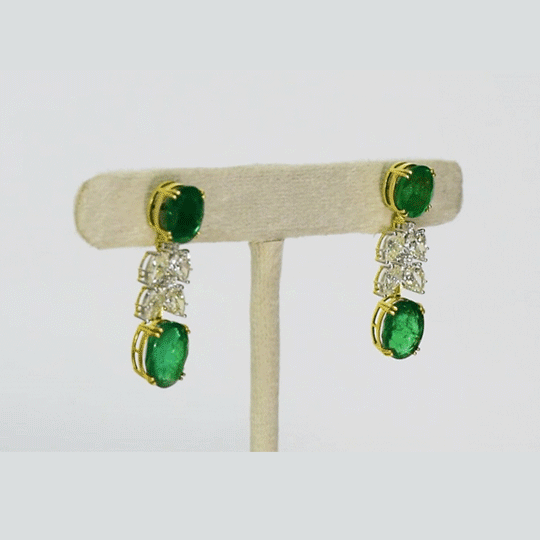 Elegant earrings featuring premium oval emeralds and pear-shaped diamonds, offering timeless beauty and refined sophistication(PGDE0424)