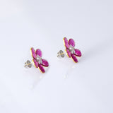 Inspired by blooming flowers, these ruby and diamond tops add a touch of color, sparkle, and sophistication to every look.(PGDE0437)