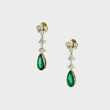 Featuring premium pear-shaped emeralds accented by shimmering diamonds, these statement earrings showcase refined craftsmanship, luxurious beauty, and a rich, graceful presence.(PGDE0439)