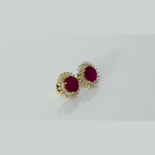 Radiant rubies surrounded by sparkling diamonds create beautiful tops that blend classic elegance with everlasting charm and grace.(PGDE0441)