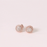 A perfect harmony of princess-cut and round diamonds, crafted into an exquisite rose gold tops pair.(PGDE0454)