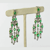 Colombian Emerald Masterpiece Exquisite necklace set featuring exceptional Colombian emeralds, brilliant round and baguette diamonds in an elegant multi-layer design, paired with graceful statement earrings radiating timeless luxury.(PGDNE057)