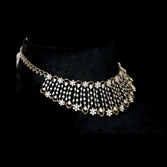Diamond Fringe Necklace Set A graceful necklace set featuring cascading round diamonds in an elegant fringe design, paired with matching statement earrings for timeless brilliance and refined sophistication.(PGDNE0138)