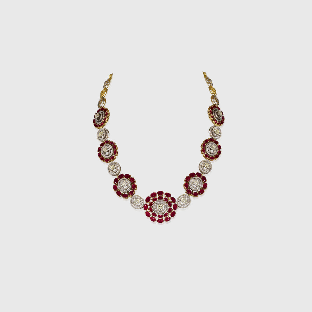 Graceful necklace and tops pair featuring oval rubies and round diamonds, highlighted by a stunning mutual cut diamond solitaire at the center—elegant, timeless, and truly captivating.(PGDNE0144)