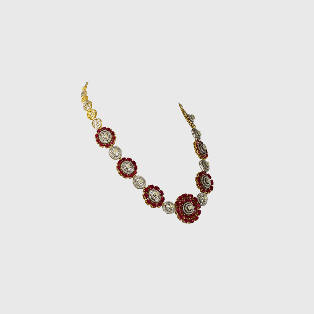 Graceful necklace and tops pair featuring oval rubies and round diamonds, highlighted by a stunning mutual cut diamond solitaire at the center—elegant, timeless, and truly captivating.(PGDNE0144)
