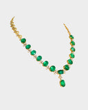 A necklace crafted with high-quality emeralds and diamonds, combining vibrant gemstones and sparkling brilliance for an elegant statement. (PGDNE0151)