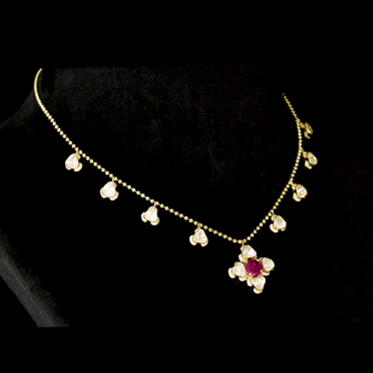 Ruby & Diamond Polki Necklace Graceful gold chain necklace featuring a vibrant ruby centerpiece, accented with diamond polki and brilliant round diamonds for timeless elegance and charm.(PGDNE0154)