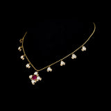 Ruby & Diamond Polki Necklace Graceful gold chain necklace featuring a vibrant ruby centerpiece, accented with diamond polki and brilliant round diamonds for timeless elegance and charm.(PGDNE0154)