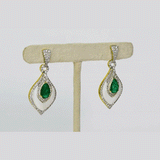 A beautifully crafted pendant and earring set featuring pear-shaped emeralds, diamonds, and mother-of-pearl, blending vibrant colour with delicate design for luxurious elegance. (PGDPE0119)