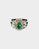 An elegant ring featuring emerald, sapphire, and diamonds, blending rich colour and brilliance for a sophisticated statement design. (PGDR0458)