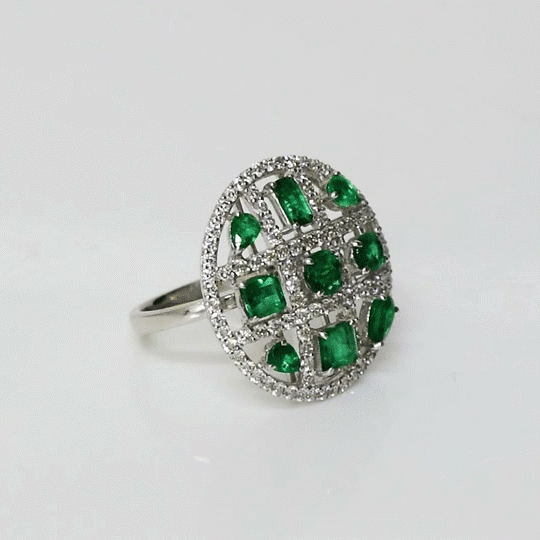 A beautiful emerald and diamond ring radiating simple elegance, vibrant colour, and timeless charm for everyday or special occasions. (PGDR0466)
