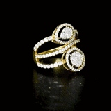 A contemporary open-band ring featuring brilliant round diamonds with multi shape diamond motifs, radiating timeless elegance and refined sophistication.(PGDR0469)