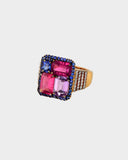 A beautifully crafted ring showcasing tourmaline, pink sapphire, blue sapphire, and diamonds, radiating elegance, vibrant colour, and distinctive style. (PGDR0470)
