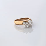 Delicate and stylish, this diamond ring showcases beautiful cuts that sparkle from every angle.(PGDR0500)