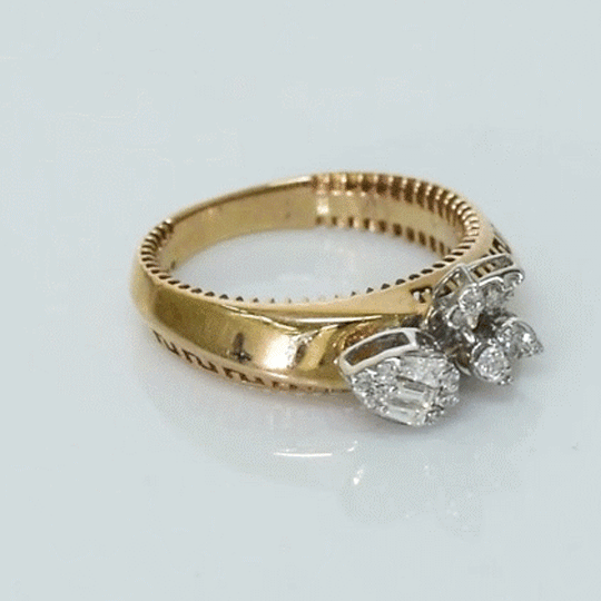 Delicate and stylish, this diamond ring showcases beautiful cuts that sparkle from every angle.(PGDR0500)