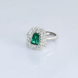A fine emerald centerpiece surrounded by sparkling diamonds, creating a timeless ring filled with elegance, beauty, and charm.(PGDR0511)